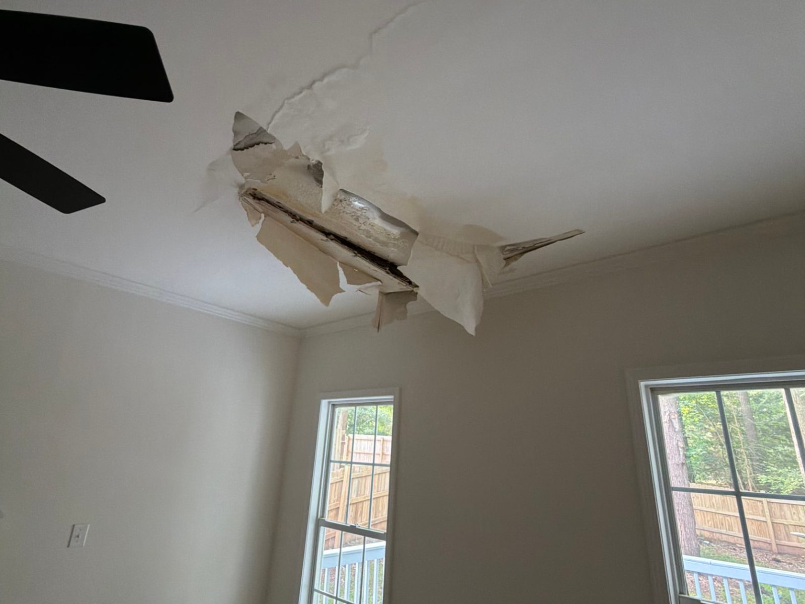 Collapsed ceiling drywall from a water leak